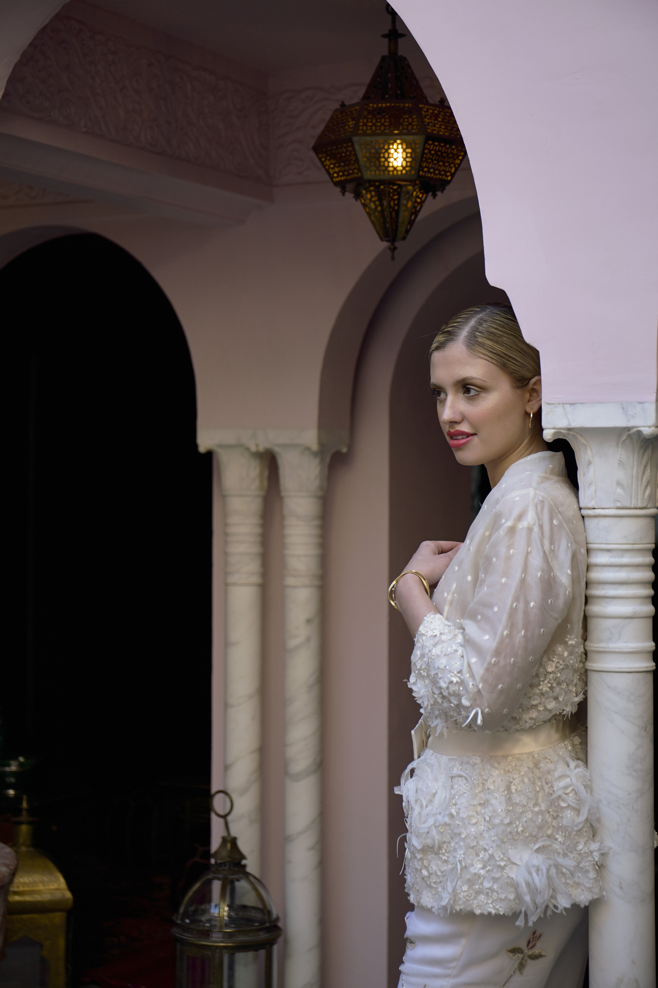42 Bowen Dryden bridal captured in a pink Marrakech inspired courtyard at Port Lympne Hotel