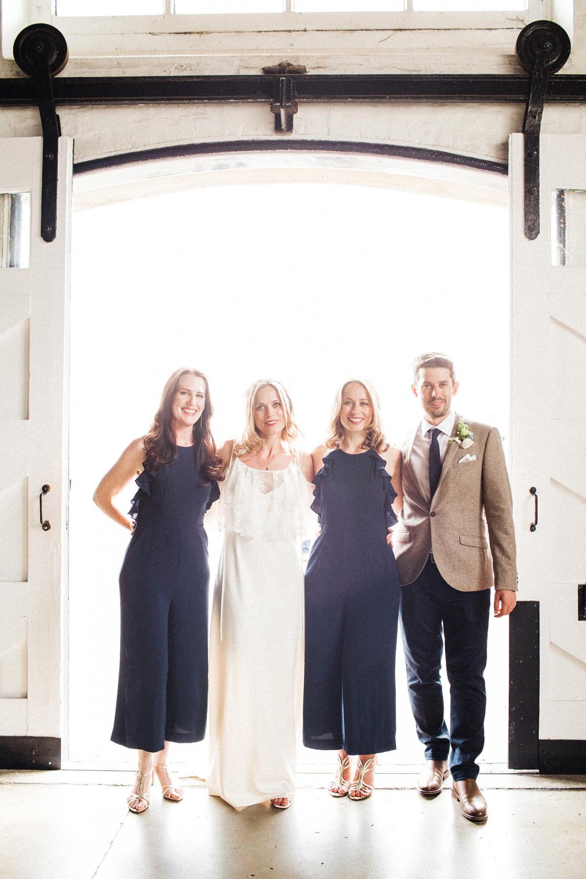 53 A Charlie Brear dress and modern fun East London riverside wedding images by Claudia Rose Carter