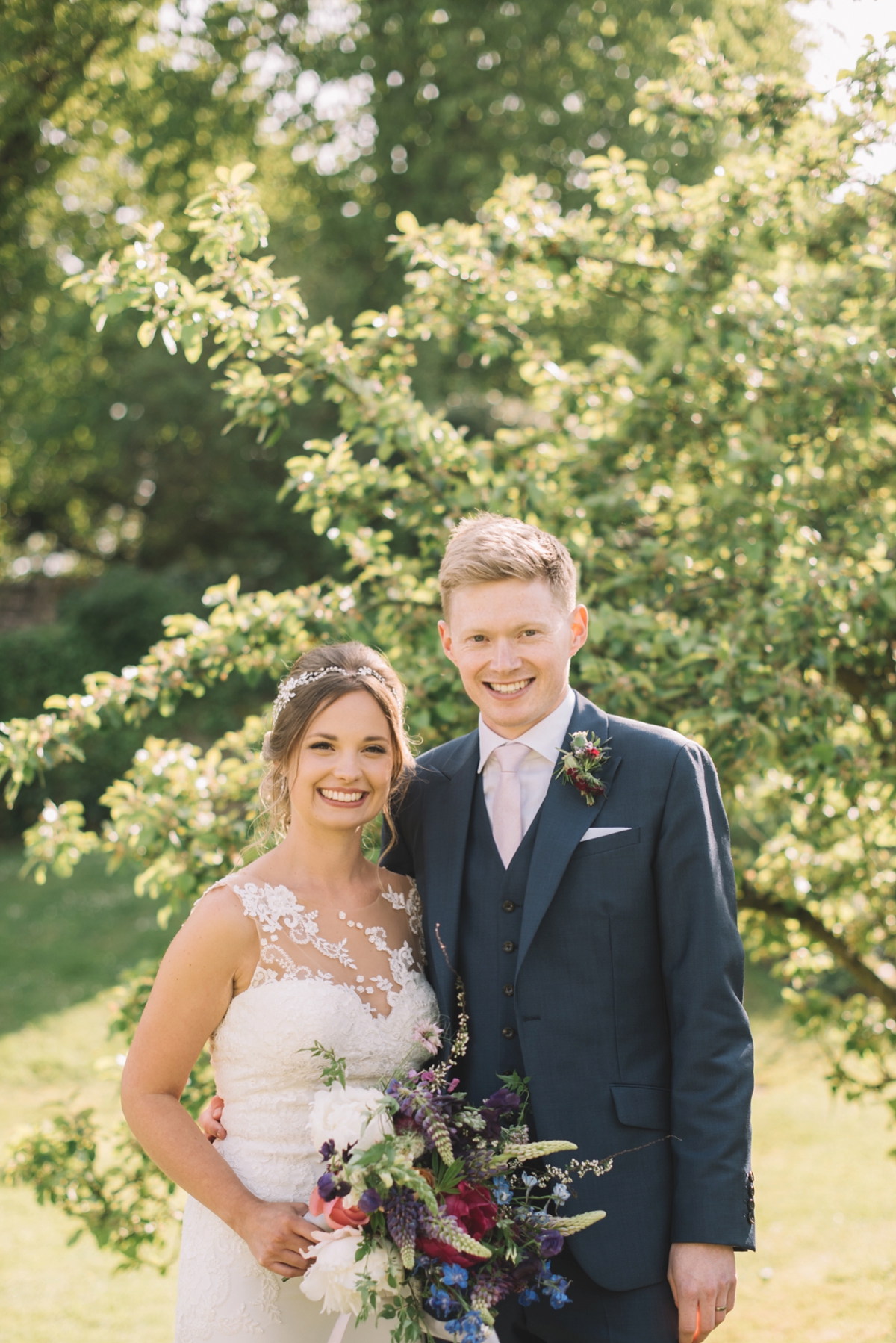 6 A fitted lace Pronovias dress for a colourful walled garden wedding in Northumberland