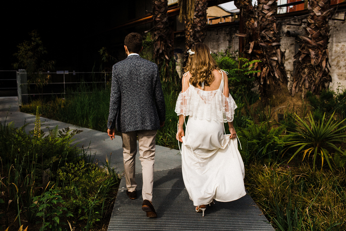 61 A Charlie Brear dress and modern fun East London riverside wedding images by Claudia Rose Carter