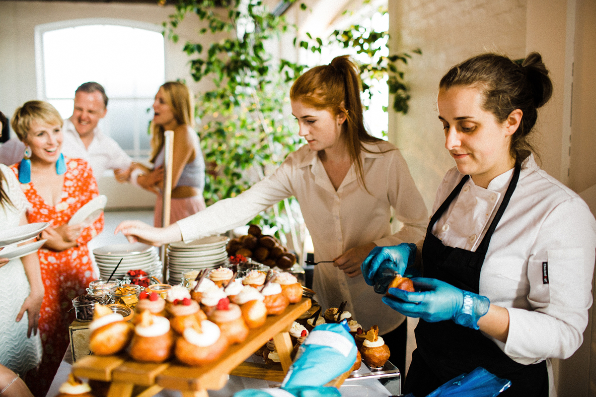 74 A Charlie Brear dress and modern fun East London riverside wedding images by Claudia Rose Carter