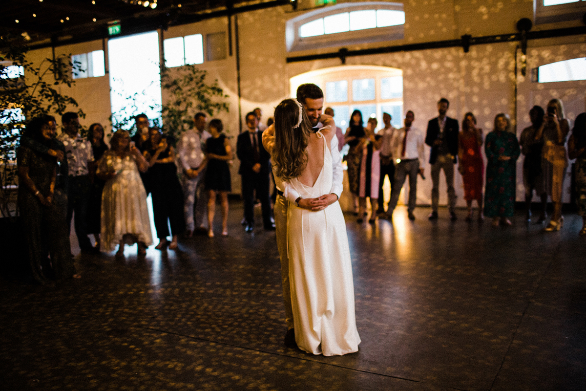 76 A Charlie Brear dress and modern fun East London riverside wedding images by Claudia Rose Carter