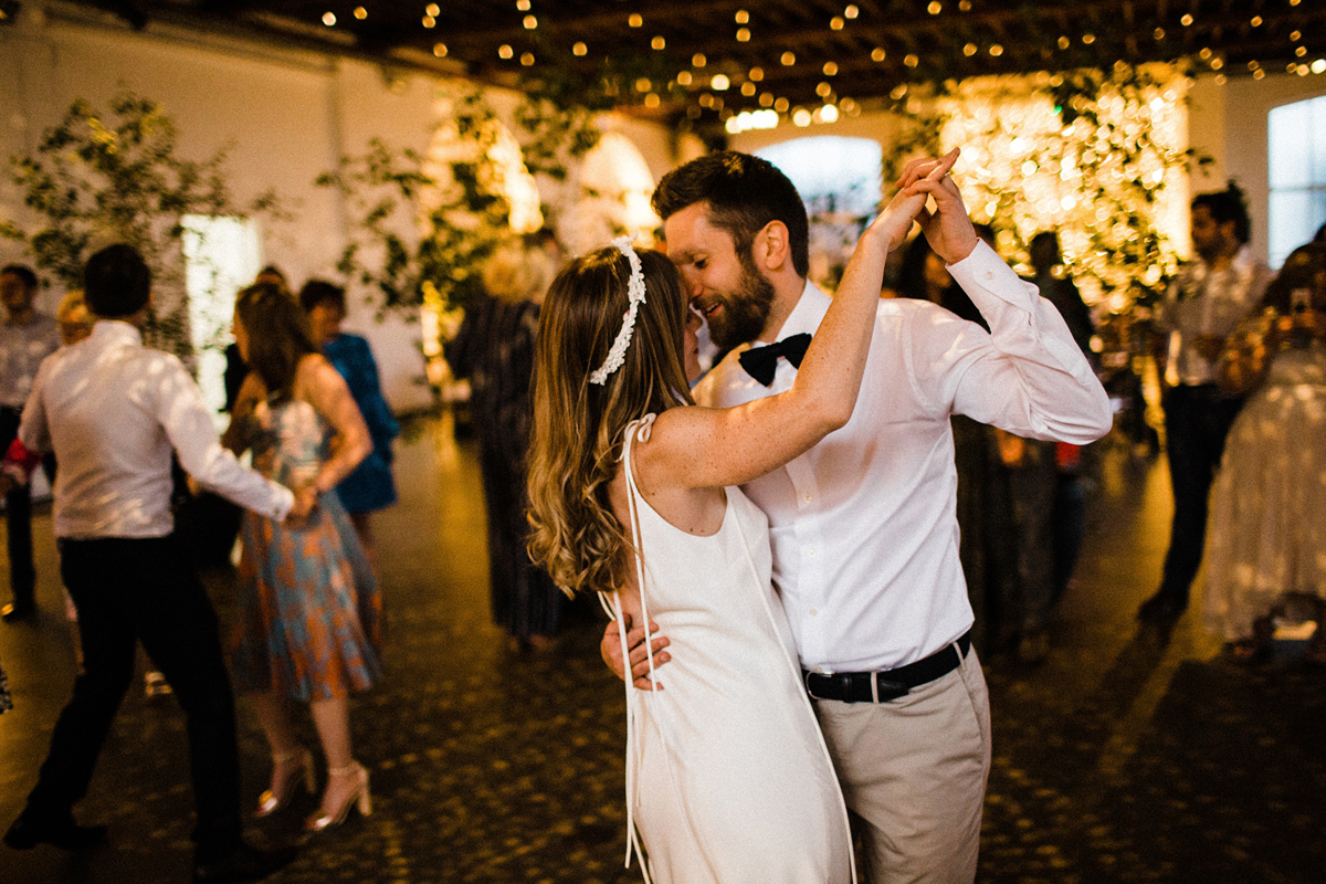 78 A Charlie Brear dress and modern fun East London riverside wedding images by Claudia Rose Carter