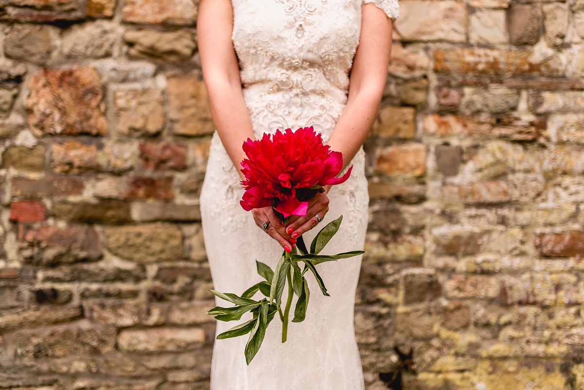 A Badgley Mischka gown for a bright and colourful devon country wedding 39