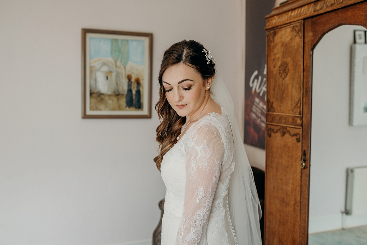 A Lillian West lace dress for a charming rainy day wedding 8