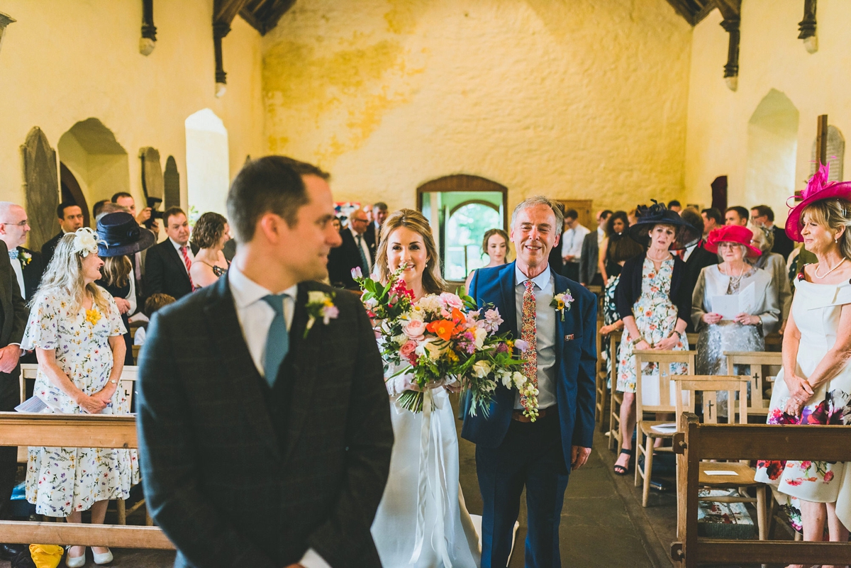A Rosa Clara bride and her colourful garden inspired Welsh castle wedding 11