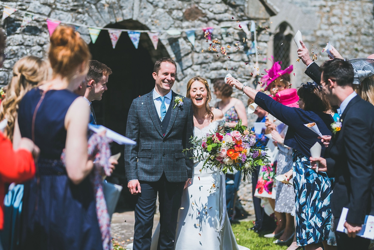 A Rosa Clara bride and her colourful garden inspired Welsh castle wedding 16