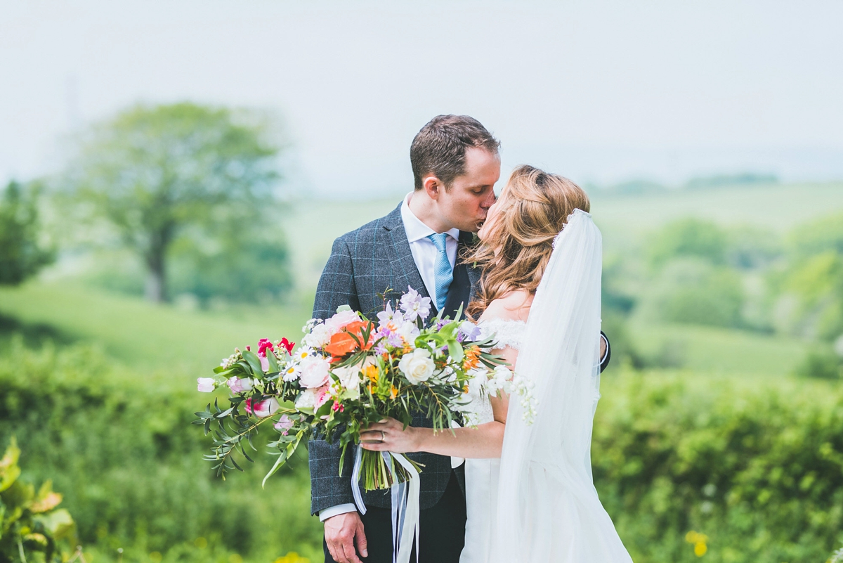 A Rosa Clara bride and her colourful garden inspired Welsh castle wedding 18