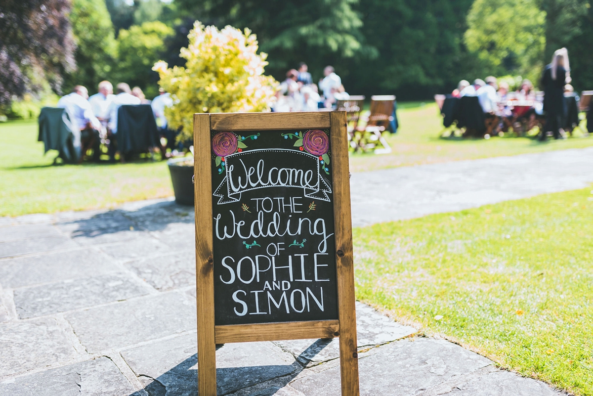 A Rosa Clara bride and her colourful garden inspired Welsh castle wedding 21