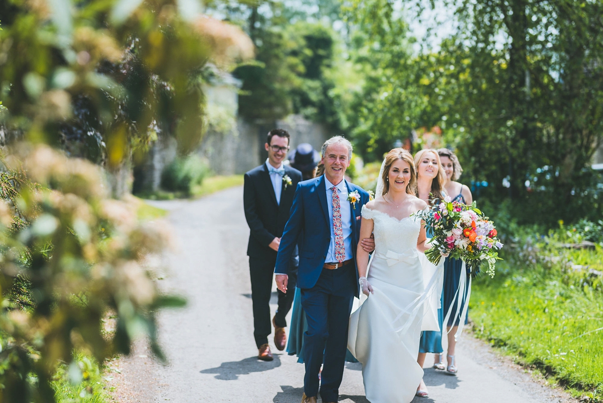 A Rosa Clara bride and her colourful garden inspired Welsh castle wedding 8