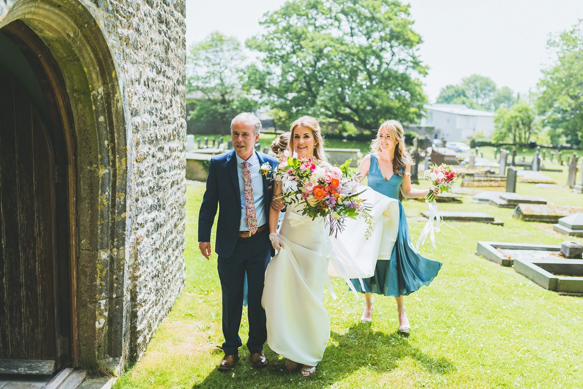 A Rosa Clara bride and her colourful garden inspired Welsh castle wedding 9