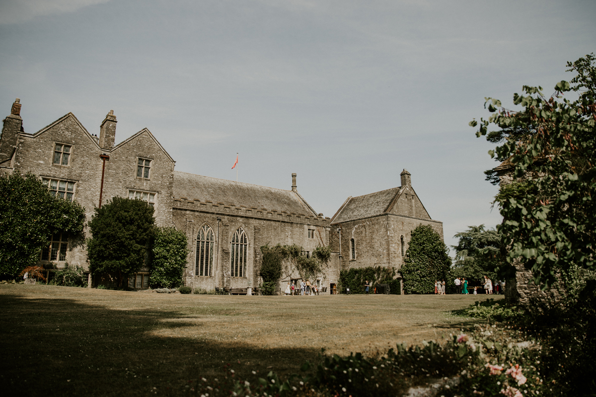 116 A Catherine Deane gown for a colourful Exeter wedding