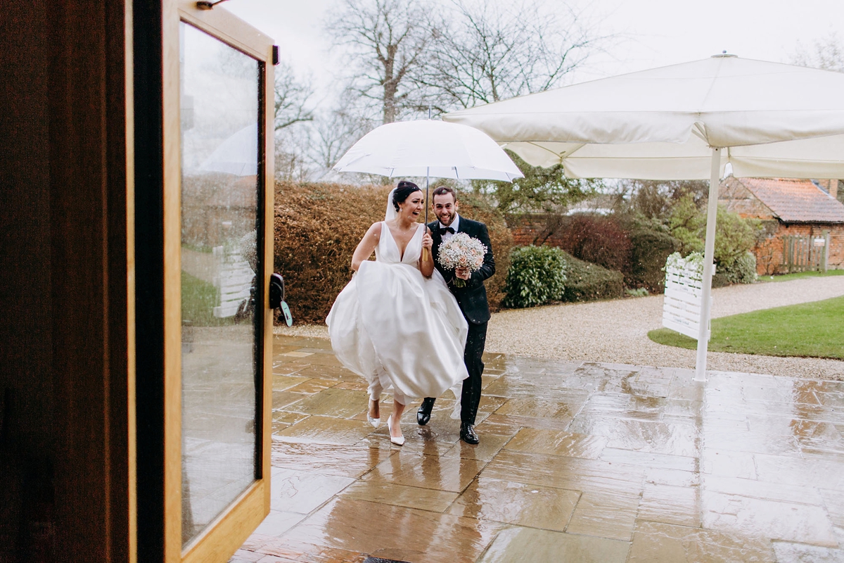 2 A silk Pronovias dress for a rainy day black tie wedding