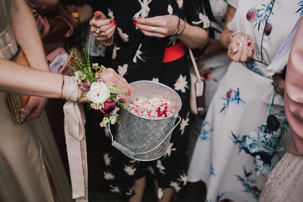 26 A customised 1970s dress for a modern non traditional London wedding. Images by Lisa Jane Photography