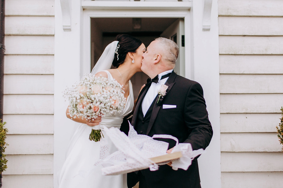 26 A silk Pronovias dress for a rainy day black tie wedding