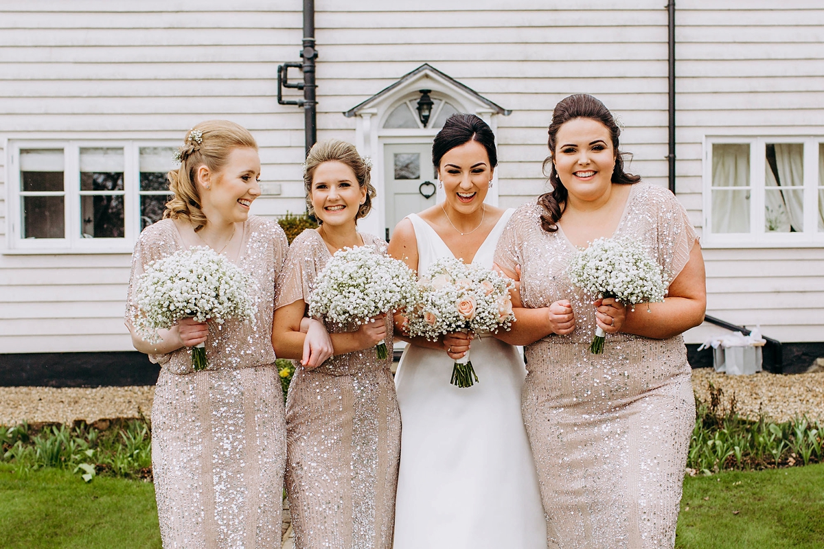 27 A silk Pronovias dress for a rainy day black tie wedding