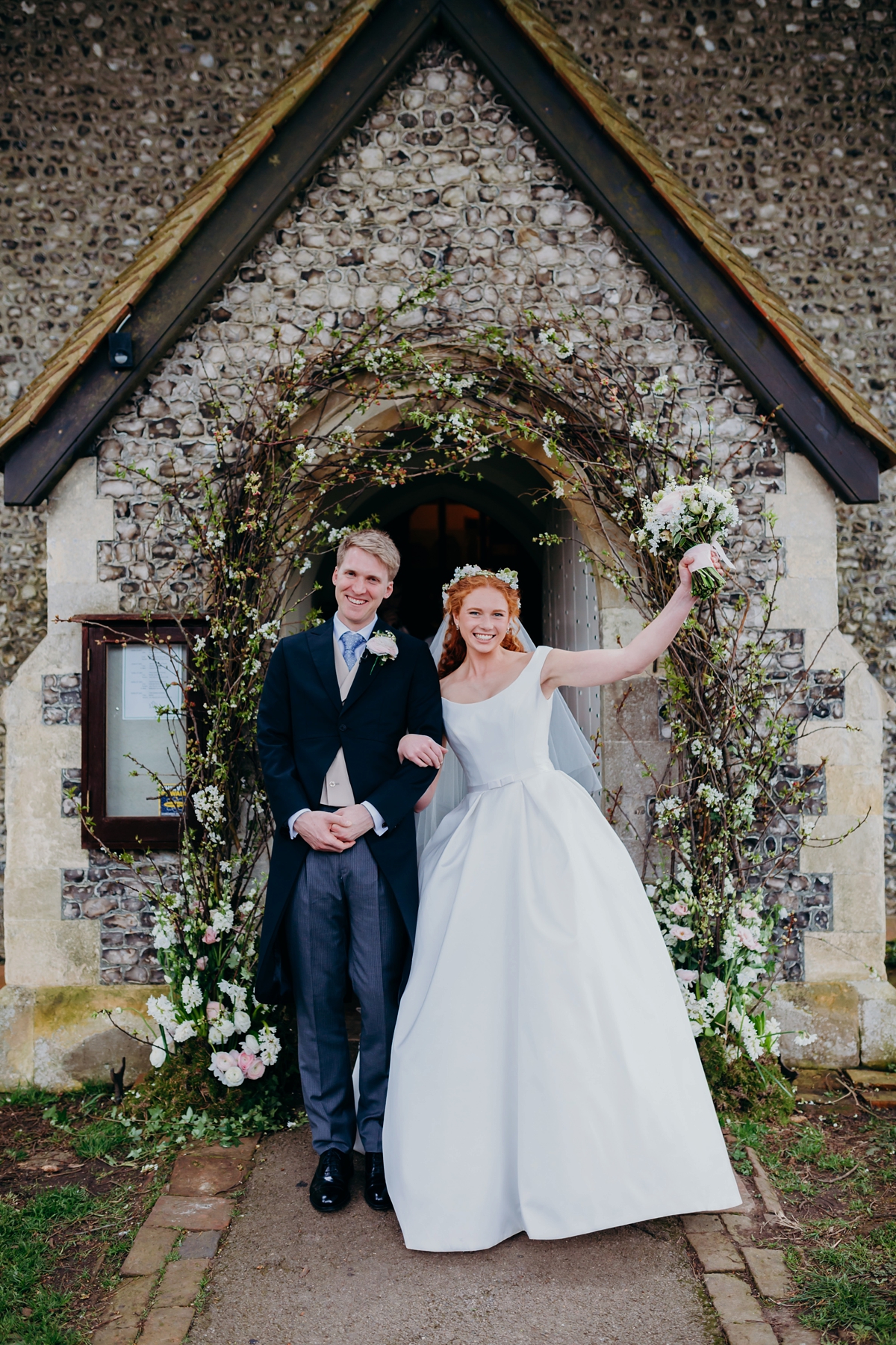 29 A Suzanne Neville gown English country wedding