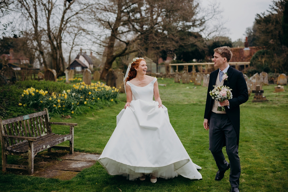 32 A Suzanne Neville gown English country wedding