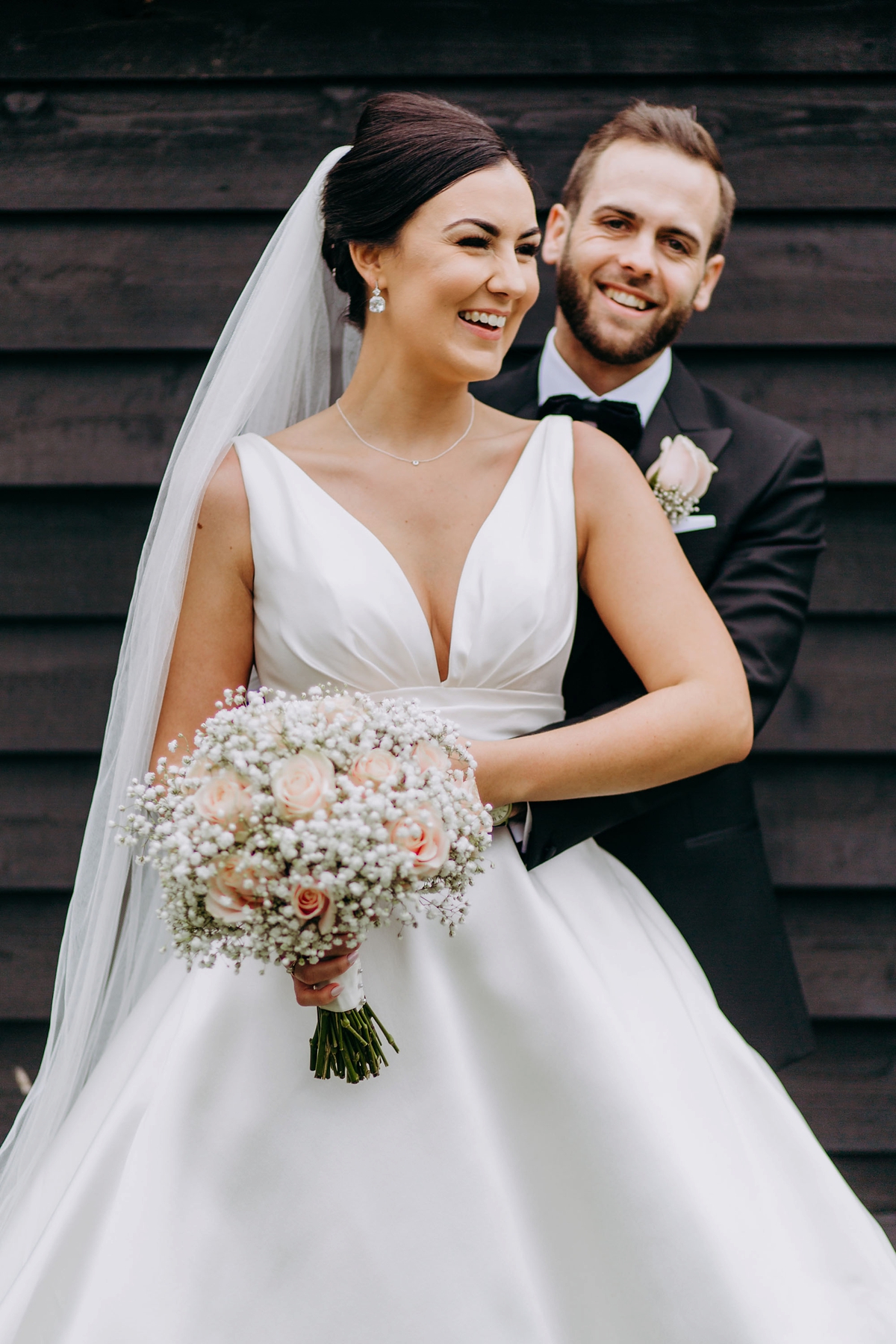 34 A silk Pronovias dress for a rainy day black tie wedding