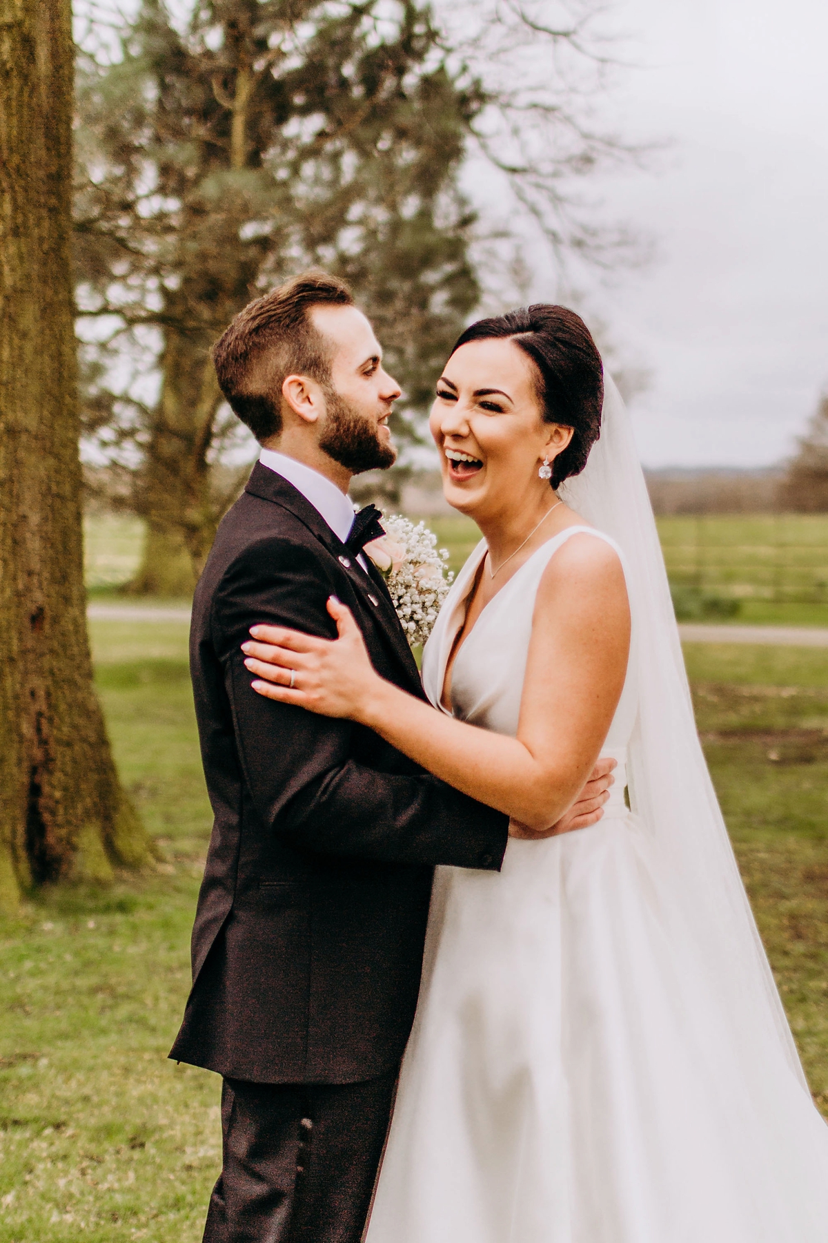 36 A silk Pronovias dress for a rainy day black tie wedding