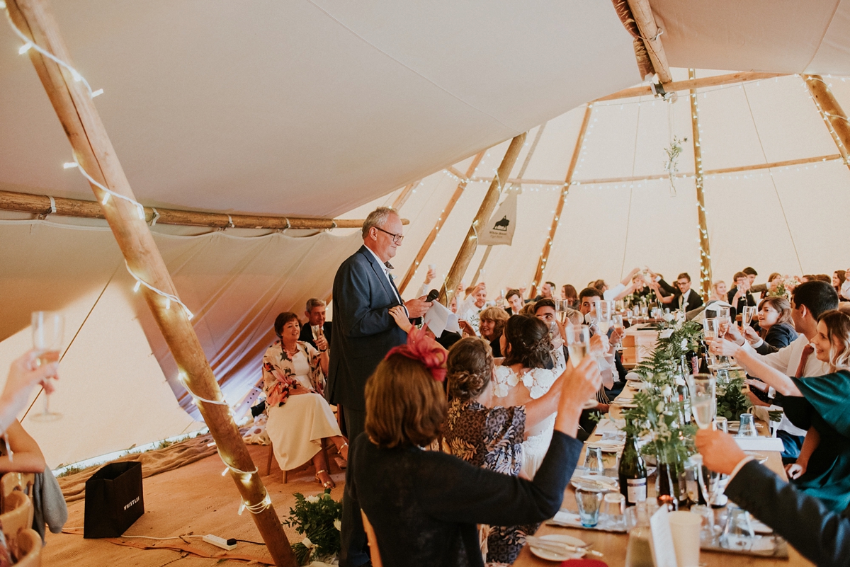 46 A Catherine Deane Dress Scandinavian inspired tipi wedding. Big Bouquet Photography.