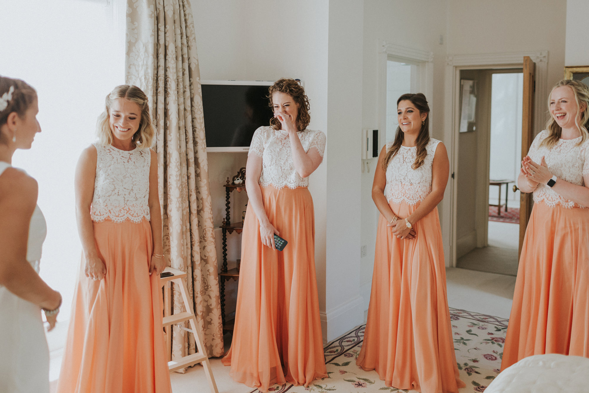 6 Peach pretty Jewish wedding va Westenius dress. Photography by We Heart Pictures.