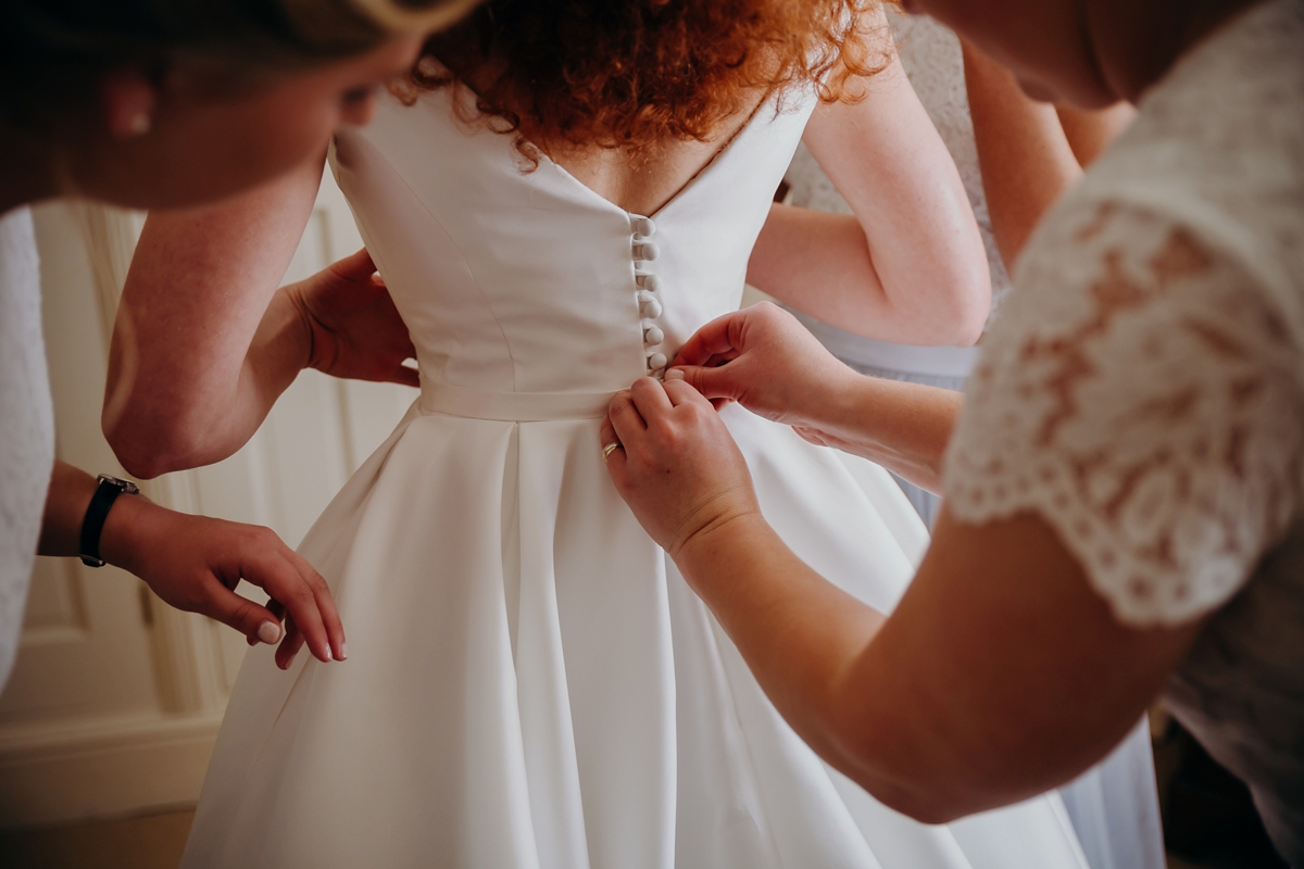 8 A Suzanne Neville gown English country wedding