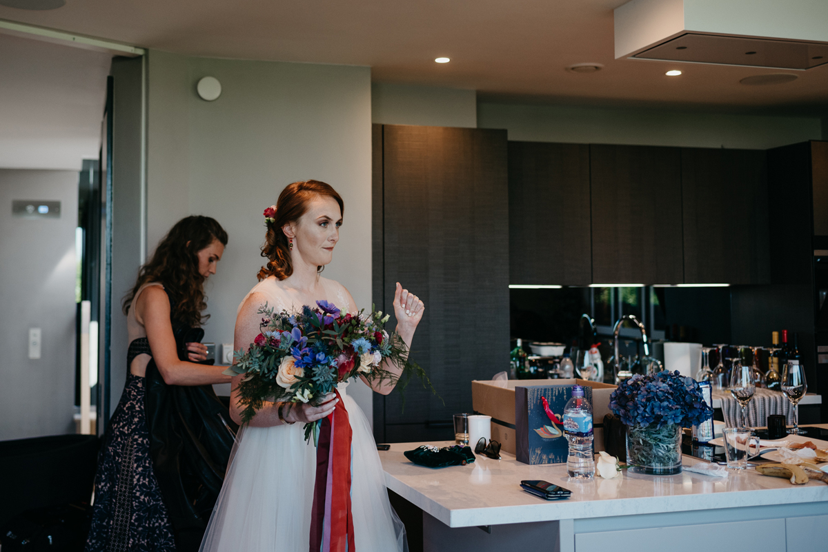 Short tulle skirt red shoes chic London family wedding Elaine Williams Photography 13