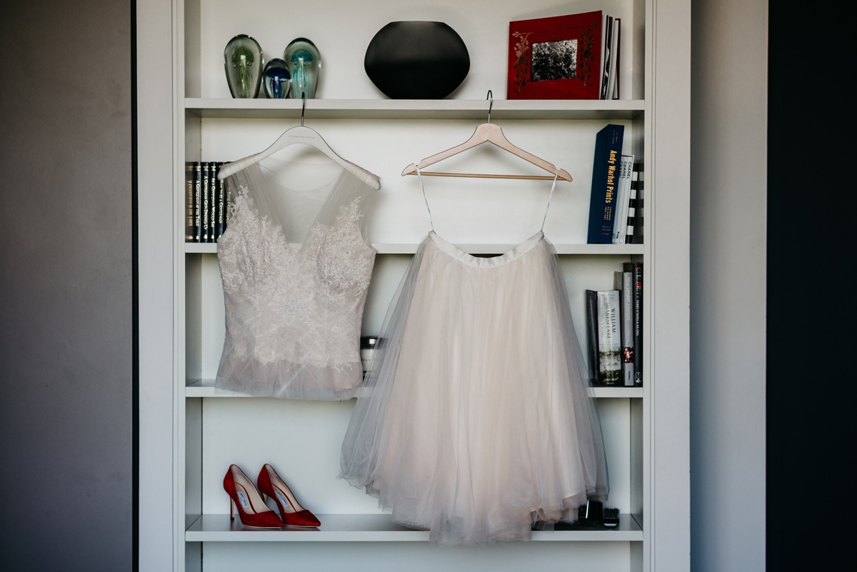 Short tulle skirt red shoes chic London family wedding Elaine Williams Photography 2