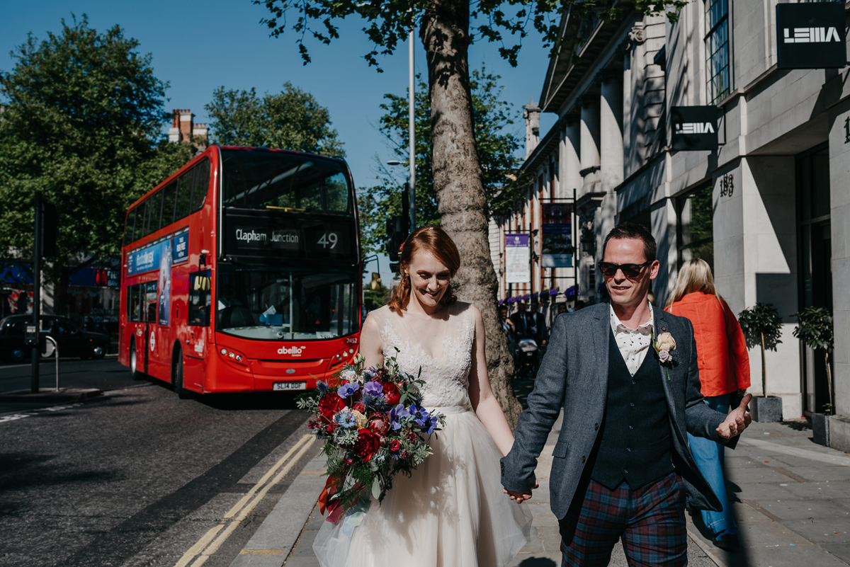 Short tulle skirt red shoes chic London family wedding Elaine Williams Photography 30
