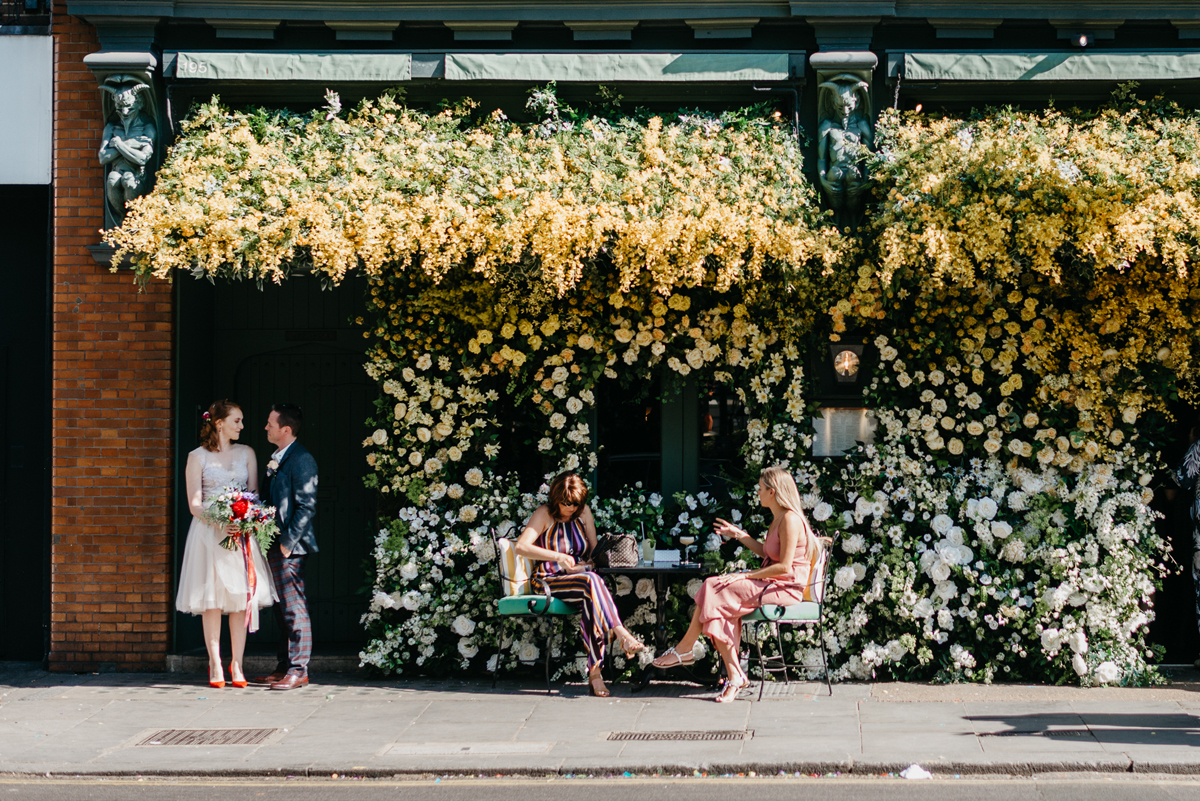 Short tulle skirt red shoes chic London family wedding Elaine Williams Photography 31