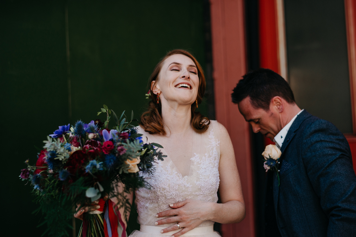 Short tulle skirt red shoes chic London family wedding Elaine Williams Photography 40