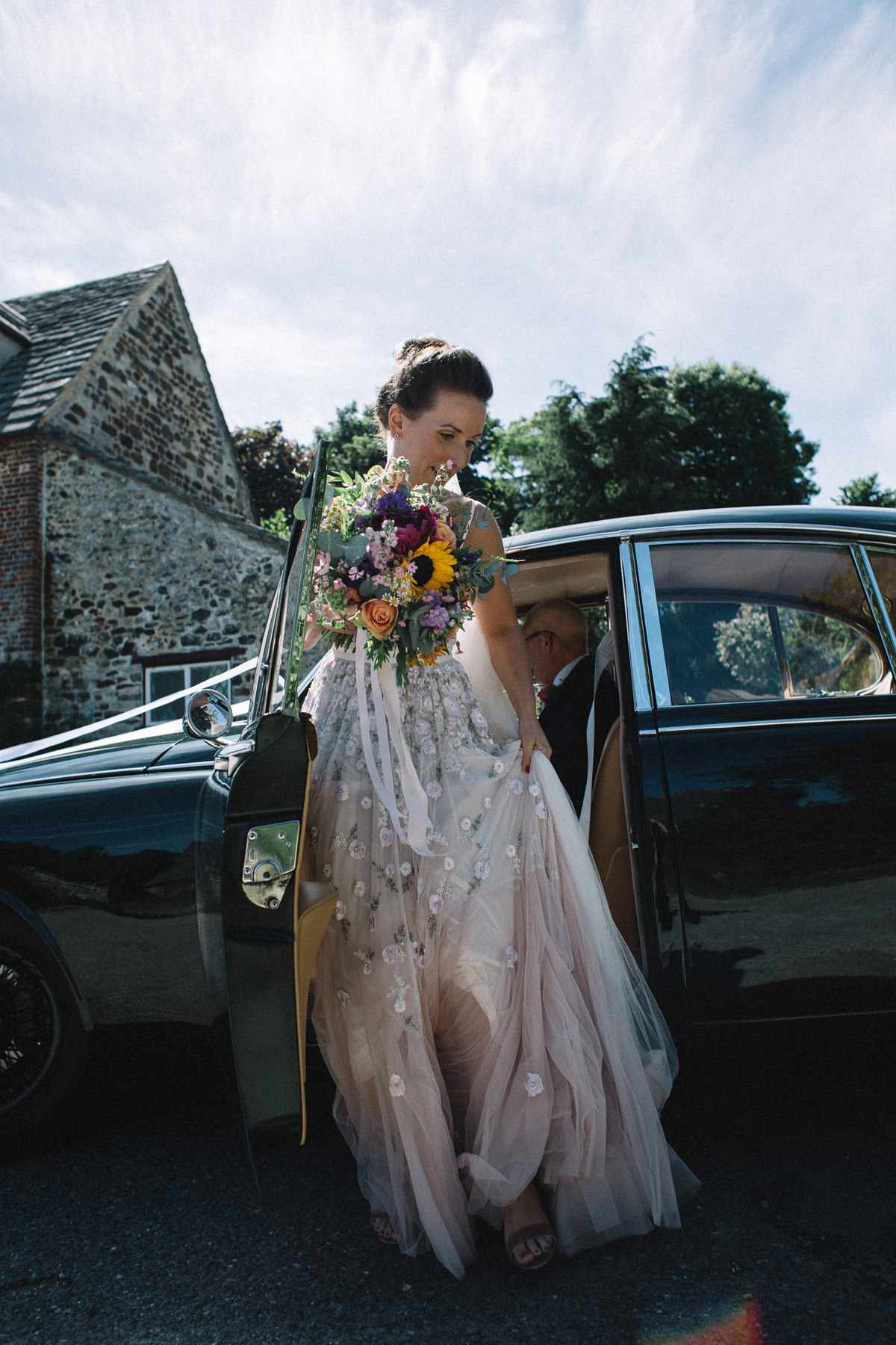 11 Needle Thread wedding dress colourful farm wedding Dorset Sarah Morris Photography