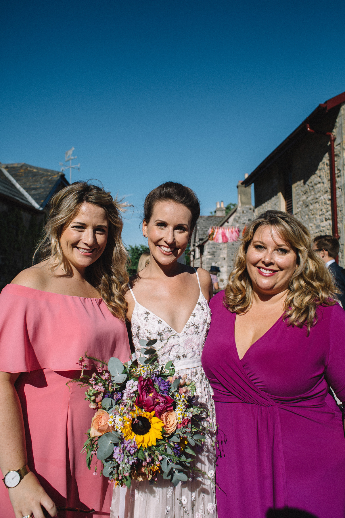 33 Needle Thread wedding dress colourful farm wedding Dorset Sarah Morris Photography