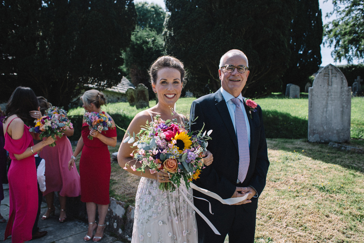 49 Needle Thread wedding dress colourful farm wedding Dorset Sarah Morris Photography