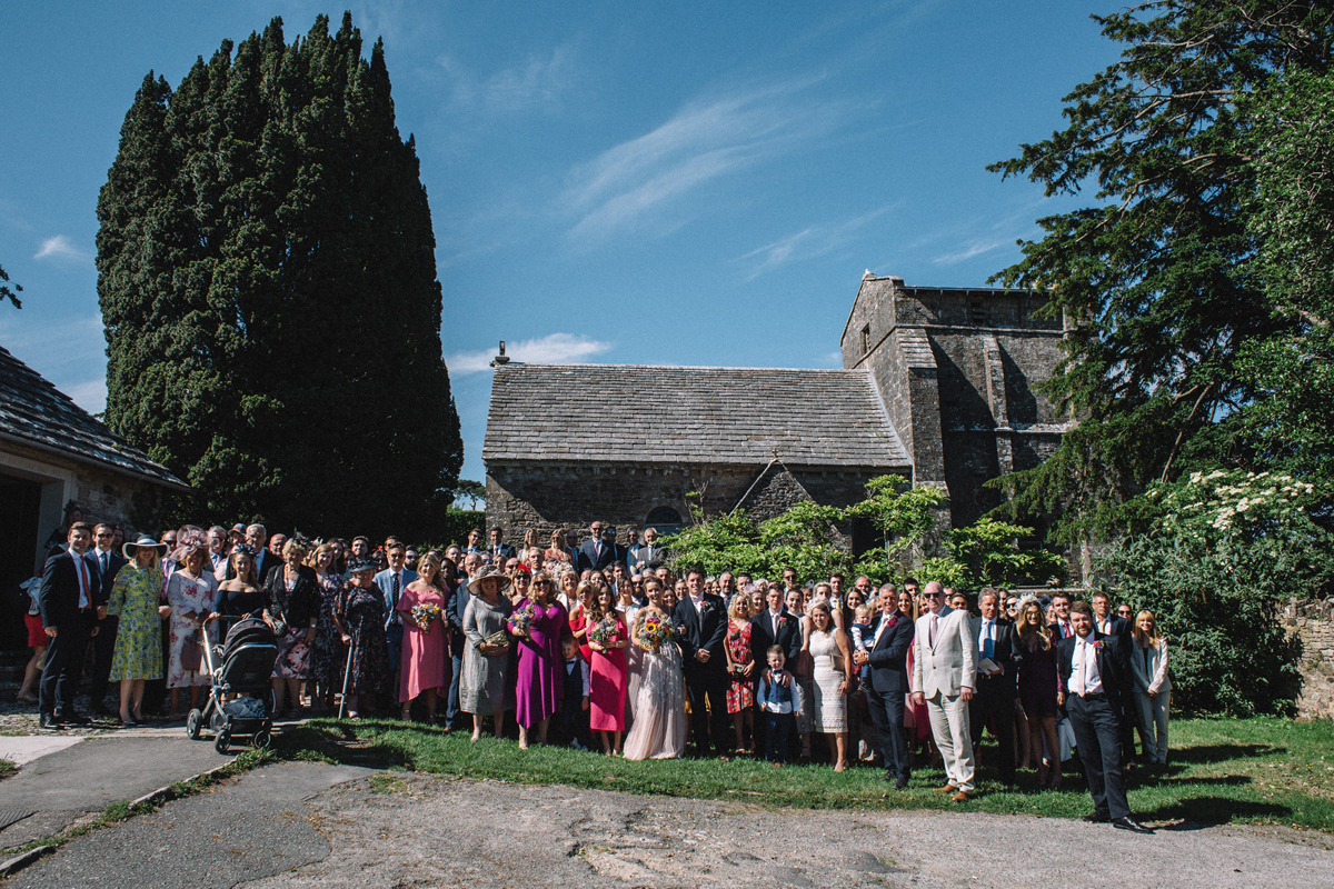 66 Needle Thread wedding dress colourful farm wedding Dorset Sarah Morris Photography