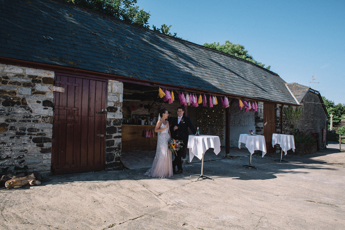 97 Needle Thread wedding dress colourful farm wedding Dorset Sarah Morris Photography