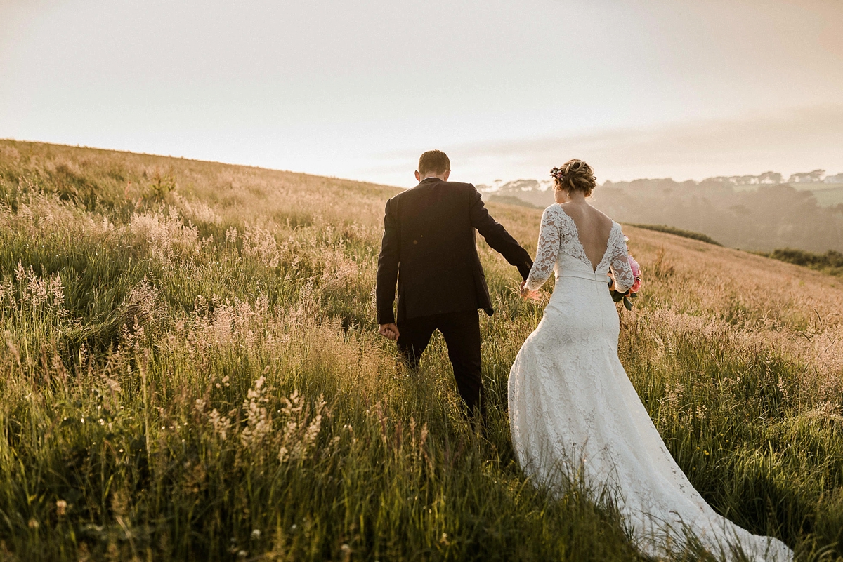 Heirloom veil colourful DIY farm wedding Cornwall 35