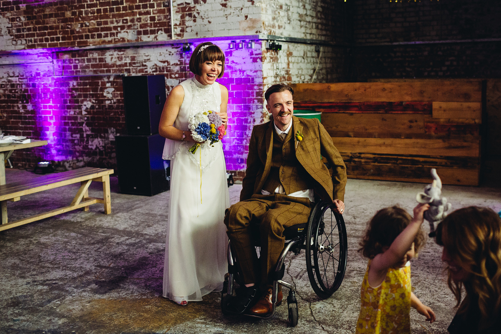 A 1970's Elizabeth Avey Dress for A Retro Bride + Disabled Groom and Their Fabulously Fun, Industrial Manchester City Wedding 1 02 Disabled groom in a wheelchair on his wedding day 1