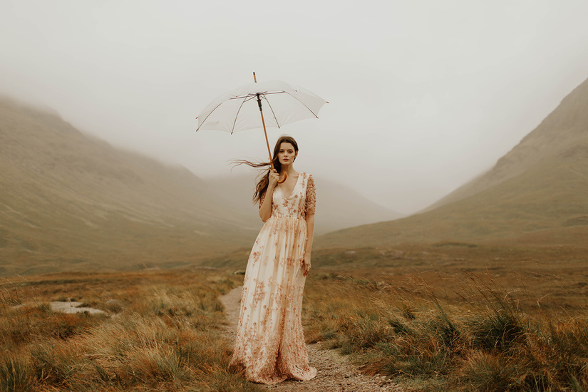 Heather Snowie Makeup Artist 1 bride standing near the misty Glencoe mountains of the Scottish Highlands