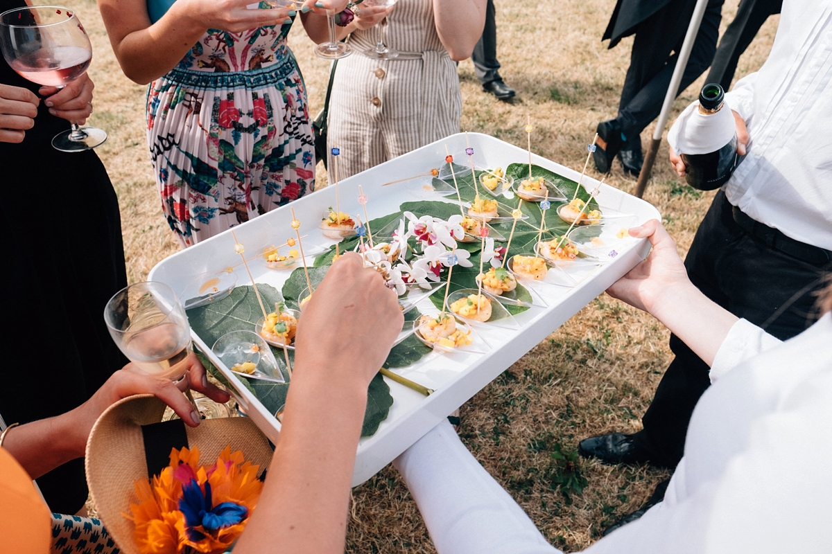 31 A floral Charlotte Balbier dress for a relaxed summer wedding in Devon