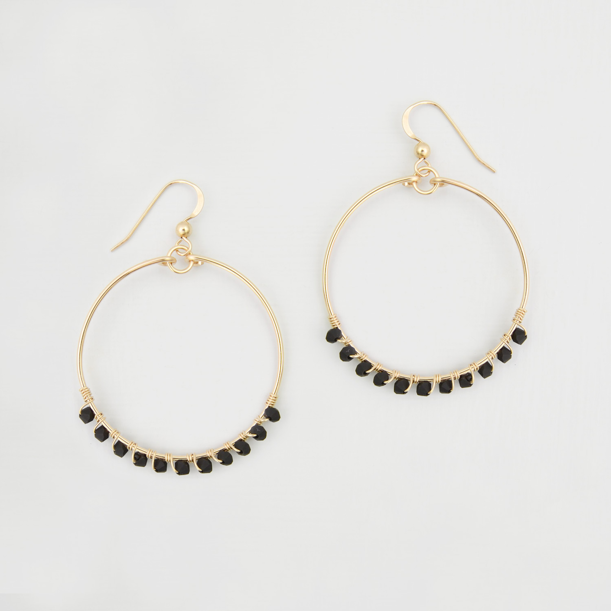 Britten Anthology Black and gold hoop gold filled earrings Britta
