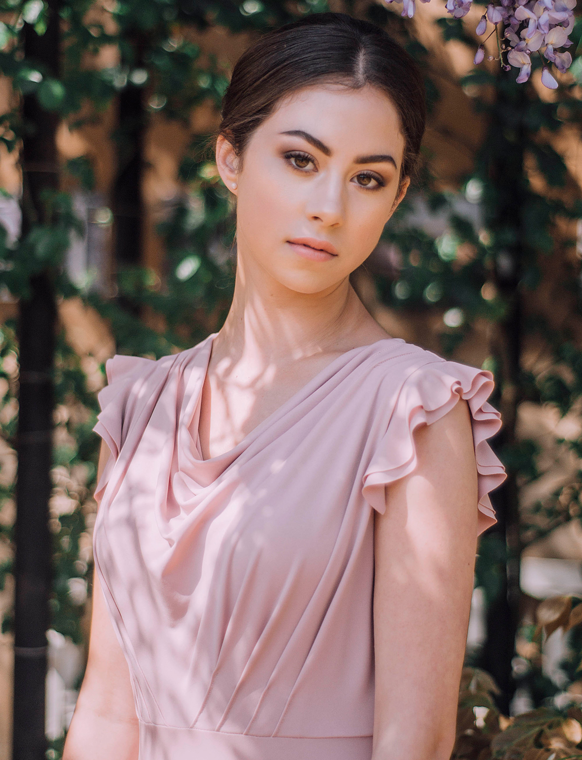 Multiway bridesmaids dresses by Willow Pearl Cloud dress with ruffle sleeves in Dusky Pink front detail 1