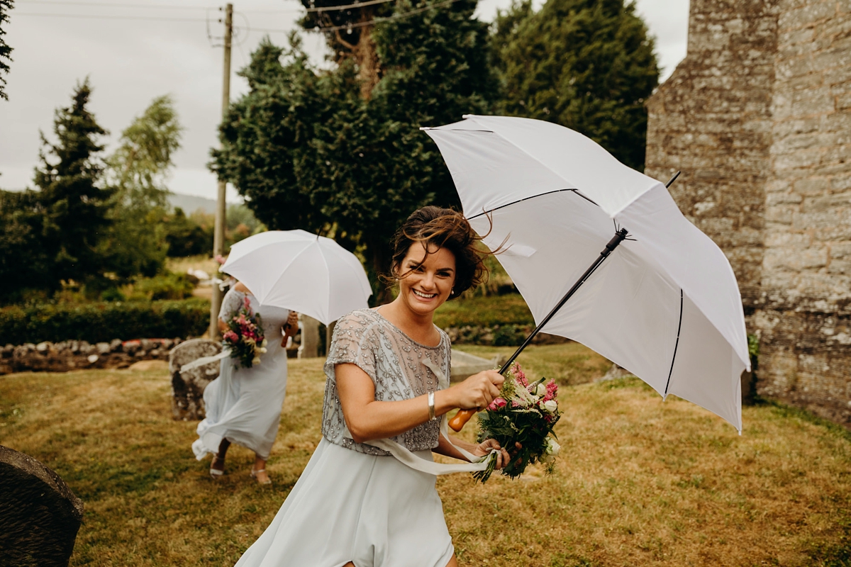 Stewart Parvin dress rainy day wedding at home Richard Skins Photography 24