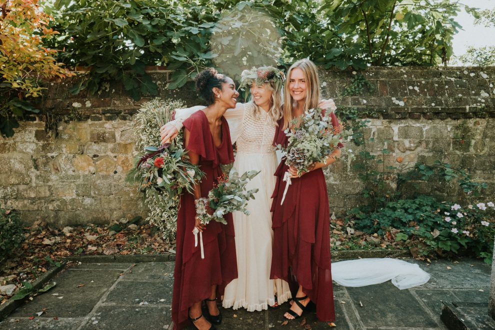 A Vintage 1970s dress for an Adventure Loving Boho Bride and Her Free-Spirited Vegan Wedding 3 01 Bridesmaids in red bride in 1970s vintage