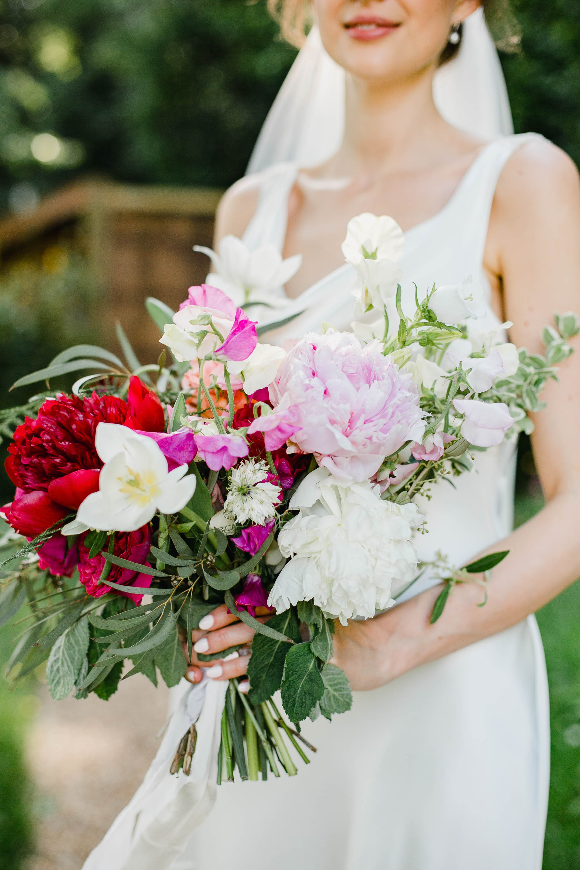 Beautiful pink peonies wedding bouquet