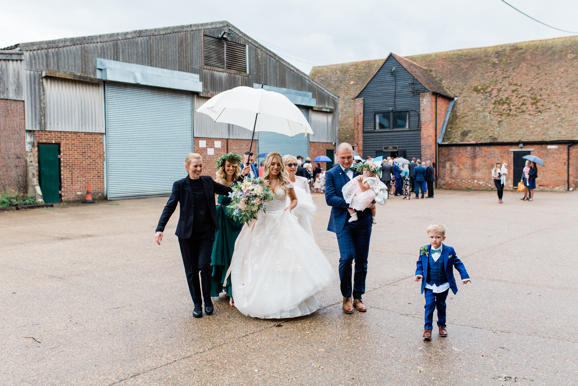 52 Maggie Sottero bride family rainy day wedding