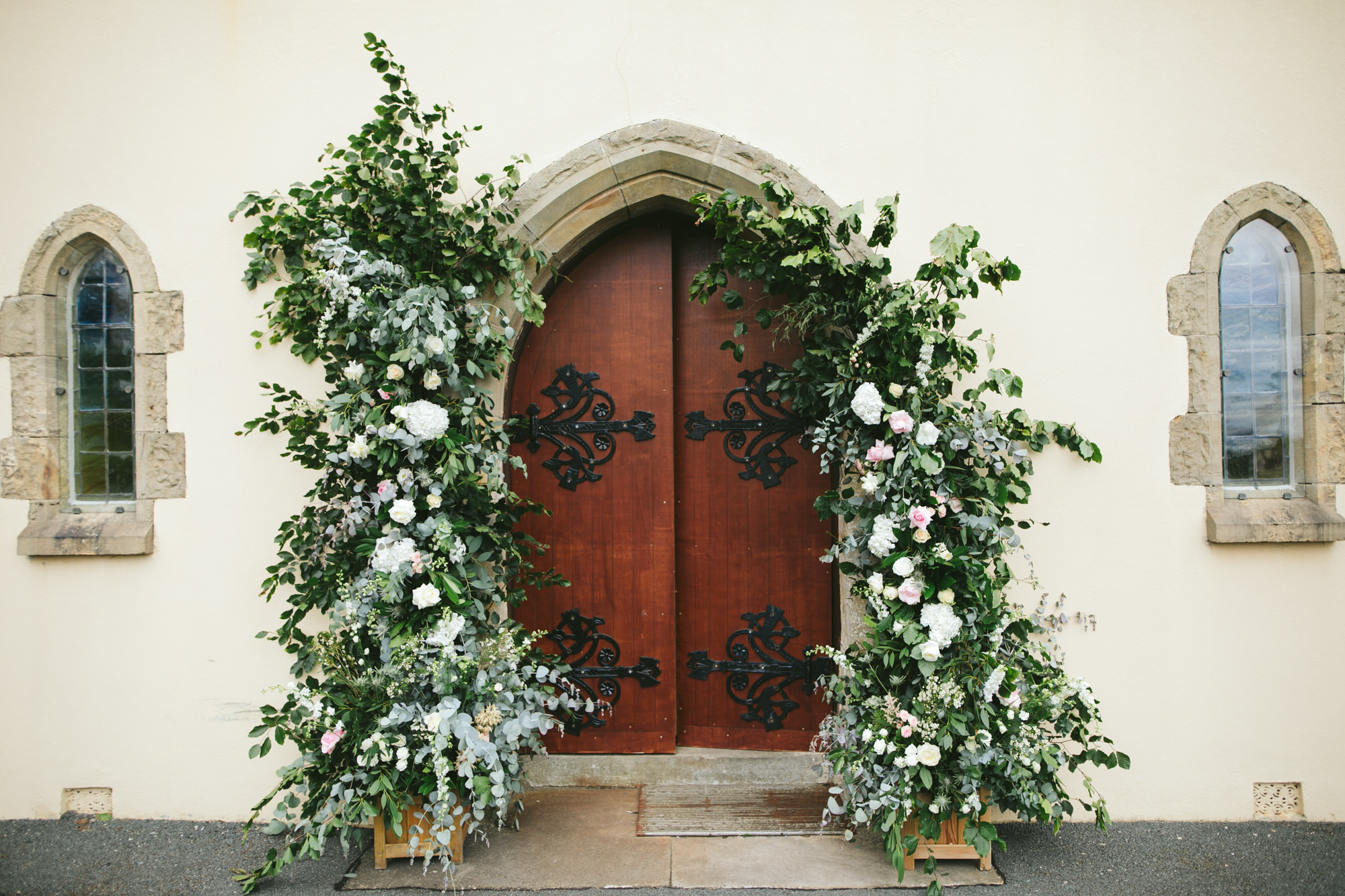 Church door decorated with flowers
