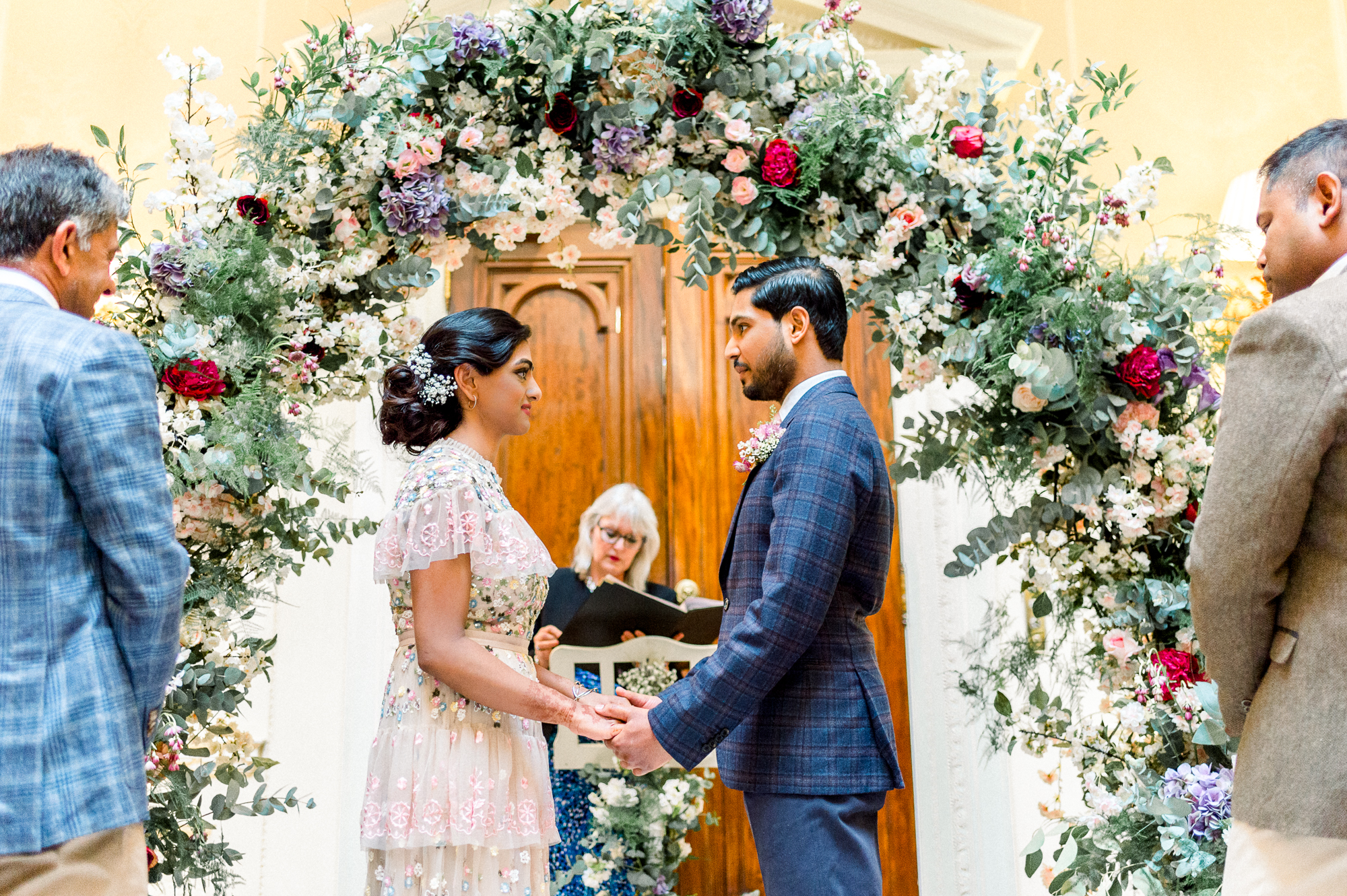 A Floral Needle & Thread Dress for a Romantic + Multicultural Summer Wedding at Hedsor House 25 Floral arch Hedsor House multicultural wedding