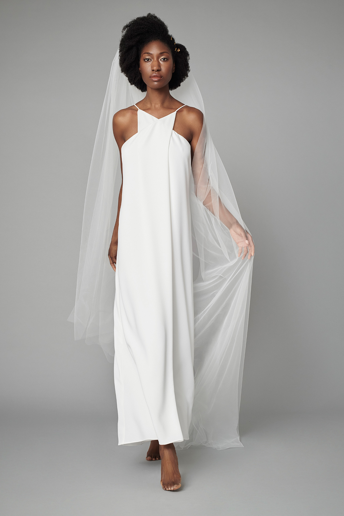 Black model in Rita Colson wedding dress